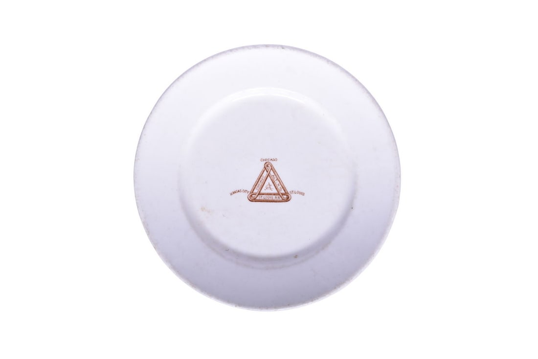 Early Chicago & Alton Railroad China Springfield Bread Plate 8 1/8": An 8 1/4" plate for the Chicago & Alton Railroad in the Springfield pattern, top marked with the Alton Route logo in brown and bottom stamped Greenwood China Trenton NJ in the ware. This is an early p