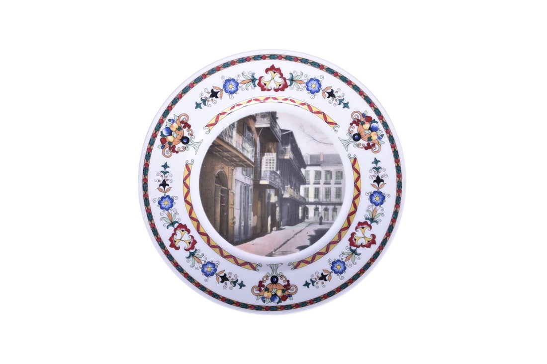 Illinois Central Railroad French Quarter Service Plate Pirate Alley New Orleans: A French Quarter service plate for the Illinois Central Railroad titled "Pirate Alley New Orleans" measuring 10 3/4". This is one of 10 from the original series used on the Panama Limited during the 1