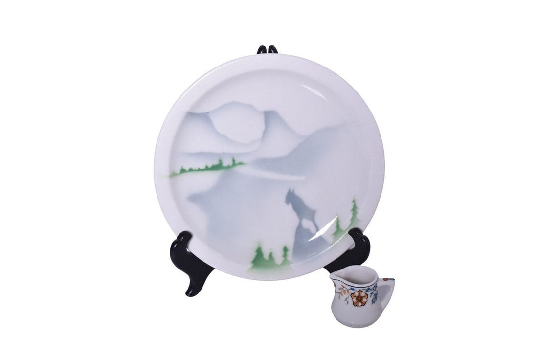 Great Northern Railway China Glory of the West Dinner Plate and Glacier Creamer: A pair of dining car items for the Great Northern Railroad. Includes a 9 1/2" dinner plate in the Glory of the West pattern by Syracuse dated 1-FF, bottom marked with the full stamp Glory of the West