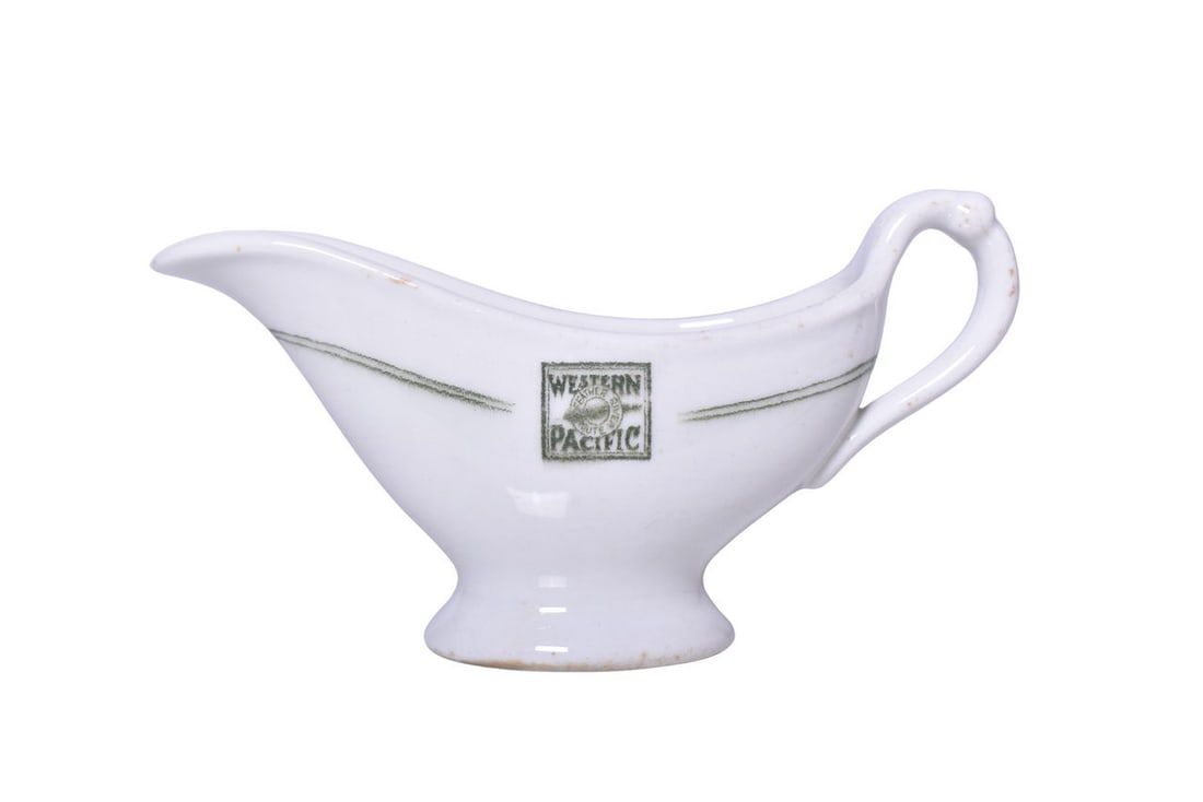 Western Pacific Railroad China Keddie Gravy Sauce Boat: A 6 1/4" long gravy sauce boat for the Western Pacific Railroad in the Keddie pattern, side marked with the Western Pacific box logo, by Warwick. This pattern pre-dates Feather River. The side mark sh