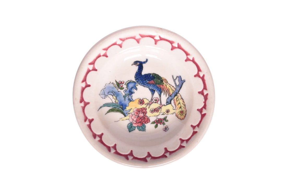 Interesting Milwaukee Road Syracuse China Peacock Butter Pat - Tan Base Red Stripe - Patent Pending: A 3" butter pat, possibly for the Chicago Milwaukee and St. Paul Railroad, in the Peacock pattern, however the base is tan (similar to adobe ware) and the stripe is red. The dish is marked on the bott