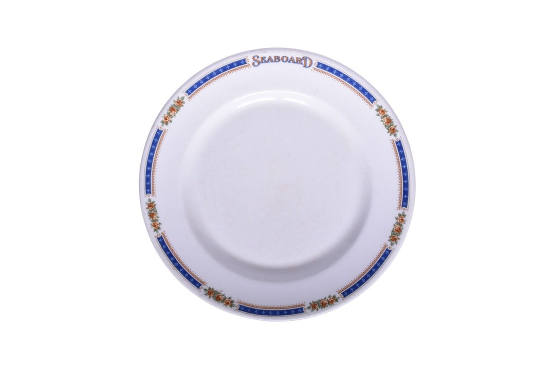 Seaboard Air Line Railroad China Palm Beach Plate: An 8 1/8" china plate for the Seaboard Air Line Railroad in the Palm Beach pattern by Syracuse 7-L, top marked Seaboard. The plate has bright clean graphics but shows moderate to heavy signs of use wi