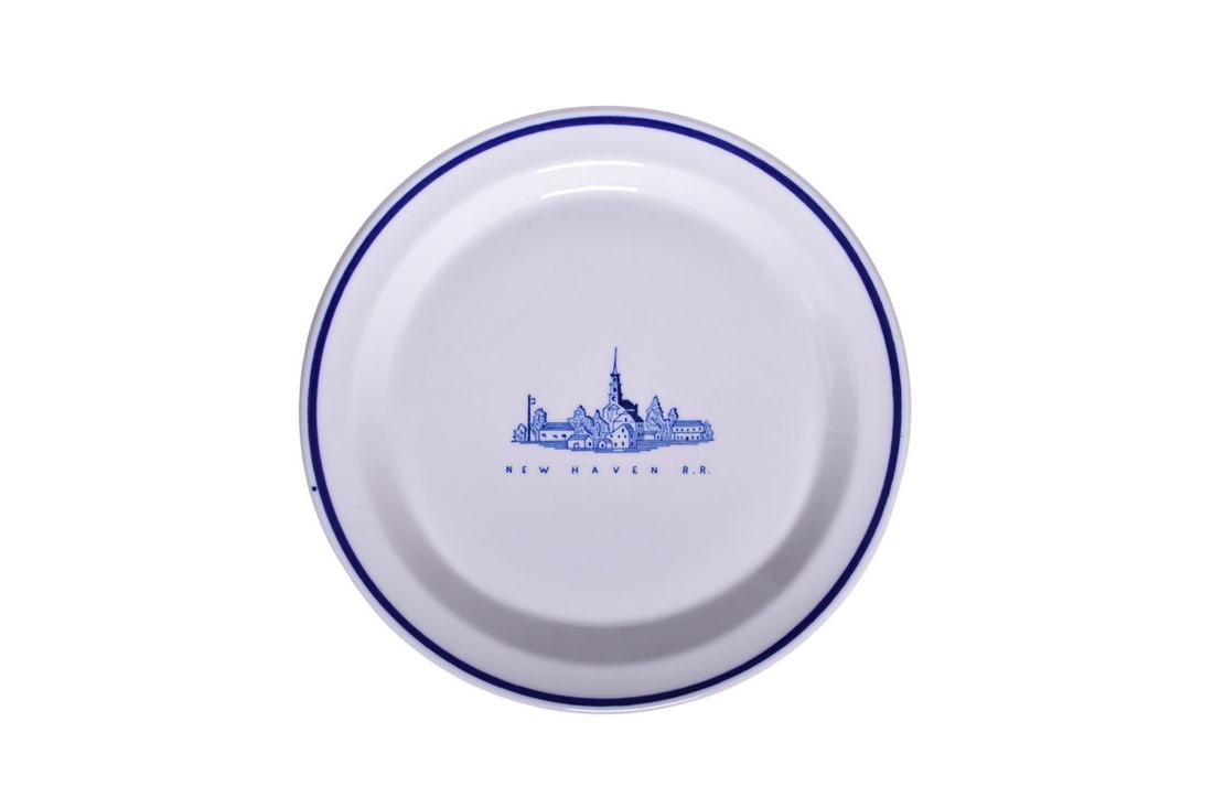 New Haven Railroad China Old Saybrook Dinner Plate 9 1/2": A 9 1/2" dining car china dinner plate for the New Haven Railroad in the Old Saybrook pattern, top marked with a town image and New Haven R.R., by McNicol China Z 62. The plate shows no signs of use,