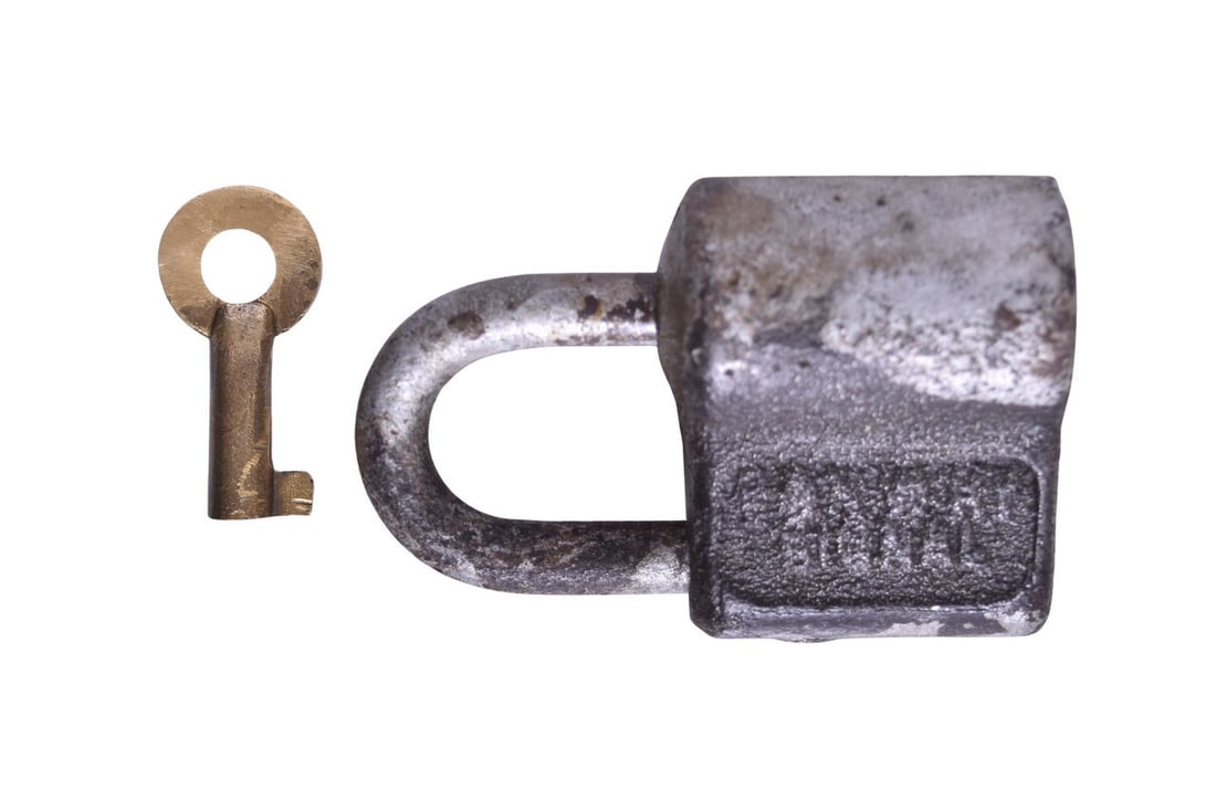 Chicago and North Western Railway Aldobilt Company Iron Signal Lock w/ Brass Key: Iron signal lock for the Chicago and North Western Railroad embossed C&NW RY SIGNAL in block letters on one side and ALDOBILT COMPANY 180 on the other. Lock body shows paint loss, discoloration, and g