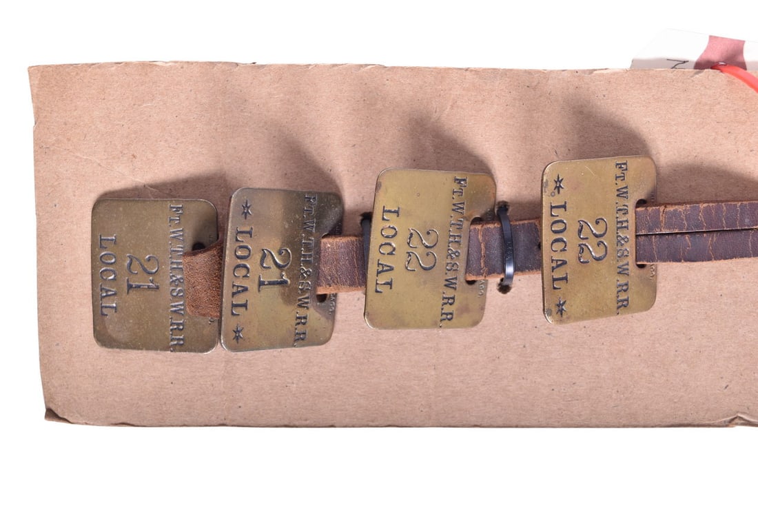 Fort Wayne, Terre Haute & Southwestern Railroad Brass Baggage Tag Set w/ Leather Strap: Nice set of four brass baggage tags with original leather strap. The four tags by J.M.W. Jone's Co. Chicago are all stamped FT.W.T.H.&S.W.R.R. in serif font with black enamel lettering. A pair for num