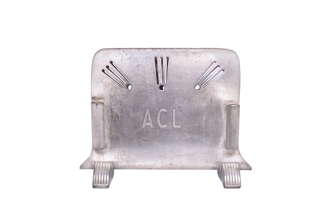 International Silver Atlantic Coast Line Railroad Menu Holder: Dining car menu holder for Atlantic Coast Line Railroad marked on one side with ACL, bottom marked ACL RR International Silver Co. 05060 dated 1951. Measures 1 7/8" x 4 5/8" tall. Shows moderate signs