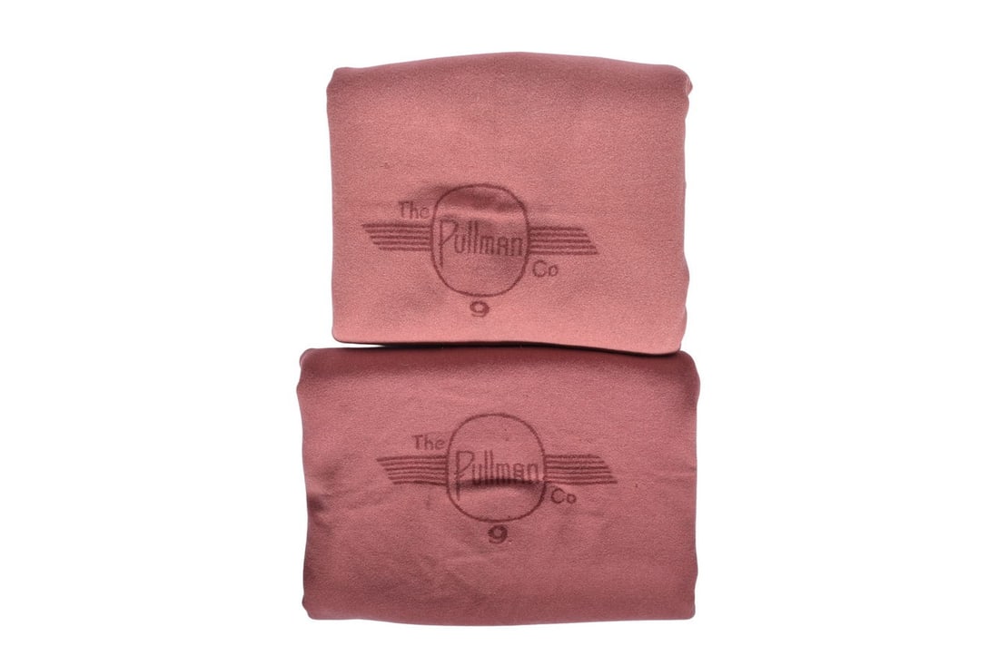 Pair of Pullman Company Railroad No. 9 Wool Blankets: Two North Star wool blankets with the Pullman Co 9 logo in the center, measuring roughly 84 x 54 inches. One blanket shows some small stain spots across the logo and worn thread at the ends. The other