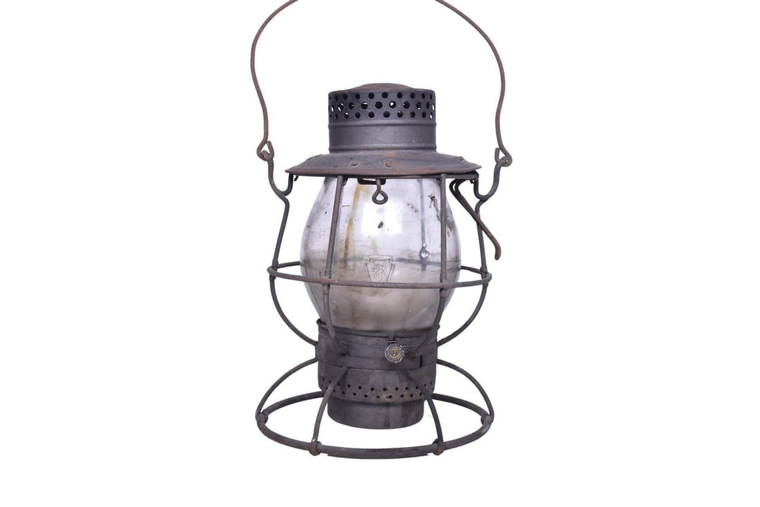 Dietz No. 39 Vulcan Pennsylvania Railroad Lantern w/ Keystone Cast Clear Globe: Dietz No. 39 Vulcan lantern with P.R.R. embossed on the shoulder. Body is in good shape with mild surface rust. Burner pot and fount are present. The tall clear Kopp globe has the Pennsylvania keyston