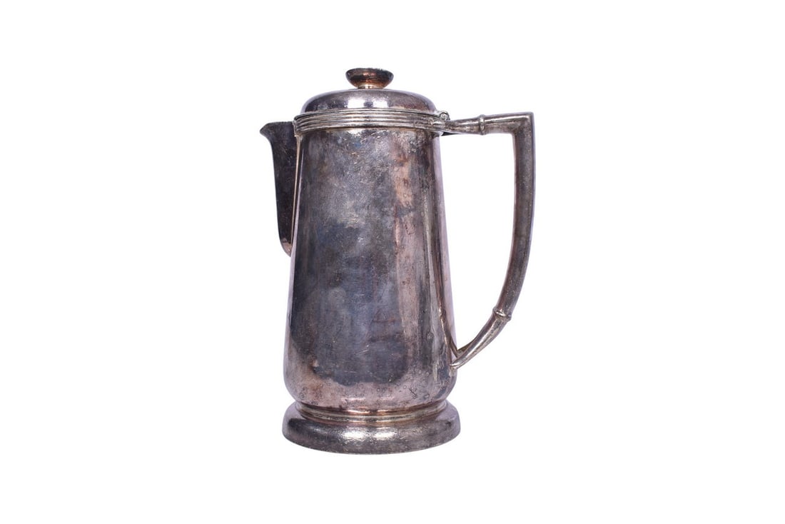 Union Pacific Railroad Silver Water Pitcher: 9-3/4" Water pitcher date stamped 1947, bottom marked "U.P.R.R.", International Silver, 54oz. Lid has been slightly depressed, but still operates and closes properly. Surface shows general signs of mo