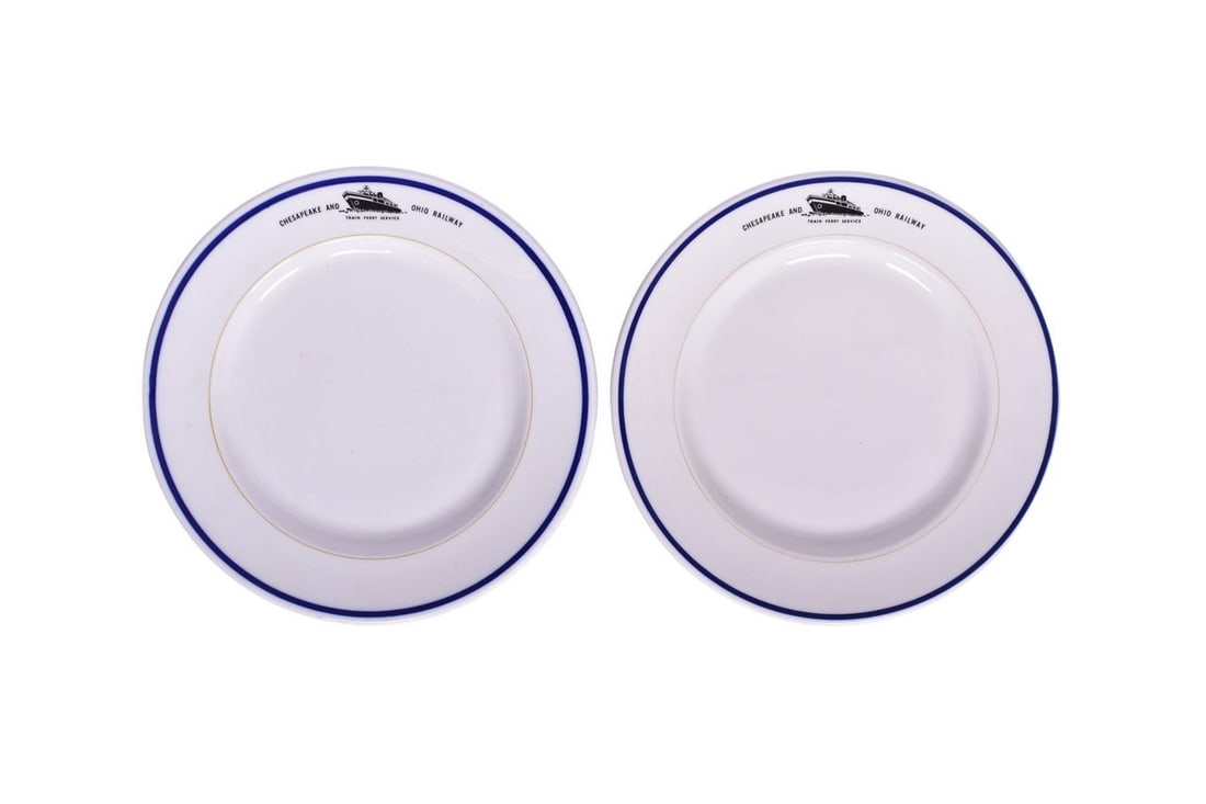 Pair of Chesapeake and Ohio Railway Train Ferry Service Dining Room China - Dinner Plates: This pair of 10" dinner plates in the Train Ferry pattern are both bottom marked Syracuse. The first plate presents with strong pattern, little-to-no stacking or utensil wear, and minor manufactured d