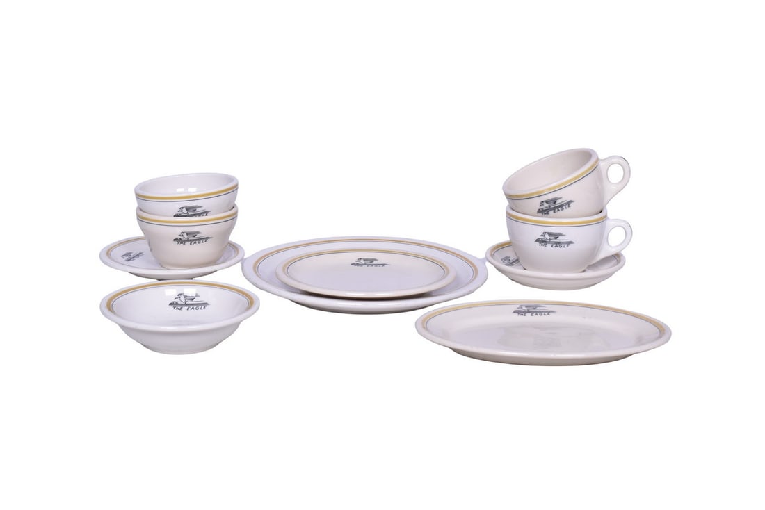 Ten Pieces of Missouri Pacific Lines Railroad China - Bullion Bowl, Coffee Cup, Oval Plate, etc.: This collection of "The Eagle" pattern china from the Missouri Pacific Lines includes: 9" round plate with moderate stacking and utensil wear in the food well and areas of minor discoloration on the r