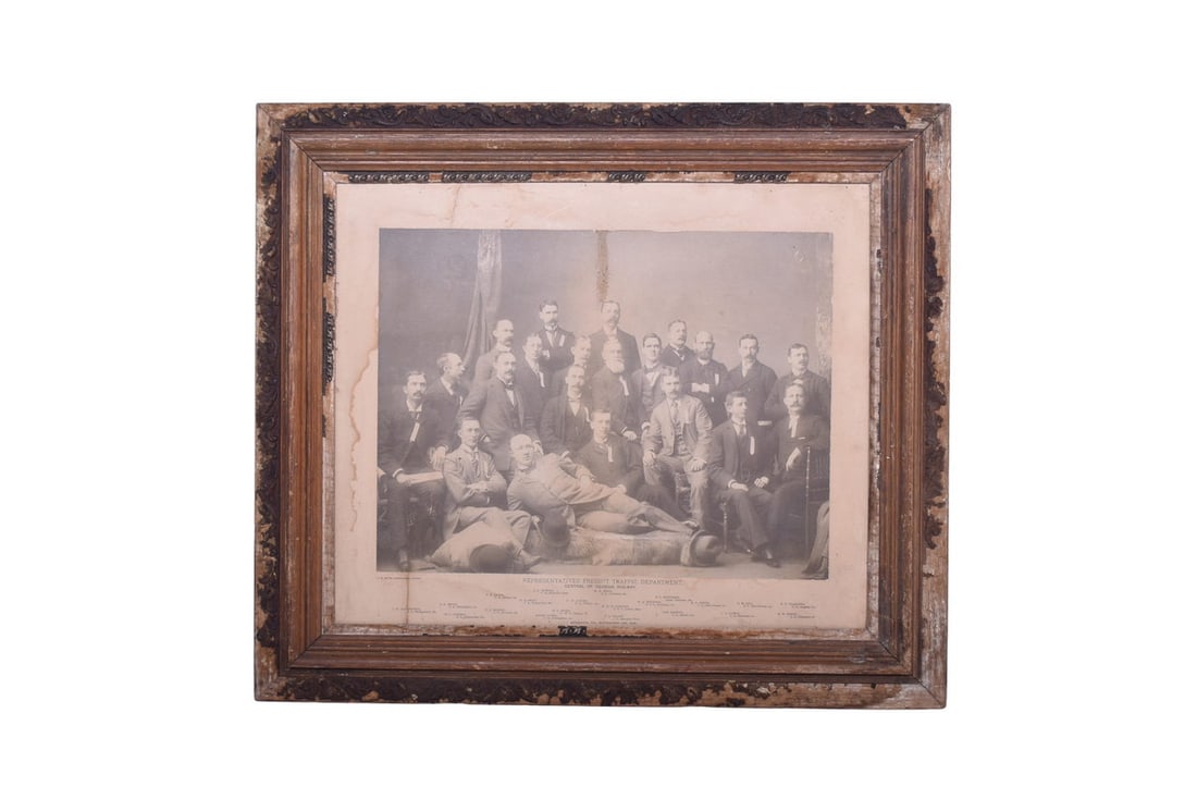 Framed Central of Georgia Railway 1895 Freight Traffic Representatives Photo: Framed X by Y photo of the 21 representatives of Central of Georgia Railway's Freight Traffic Dept. Photograph has a wide border with the names of all of the representatives as well as the photographe