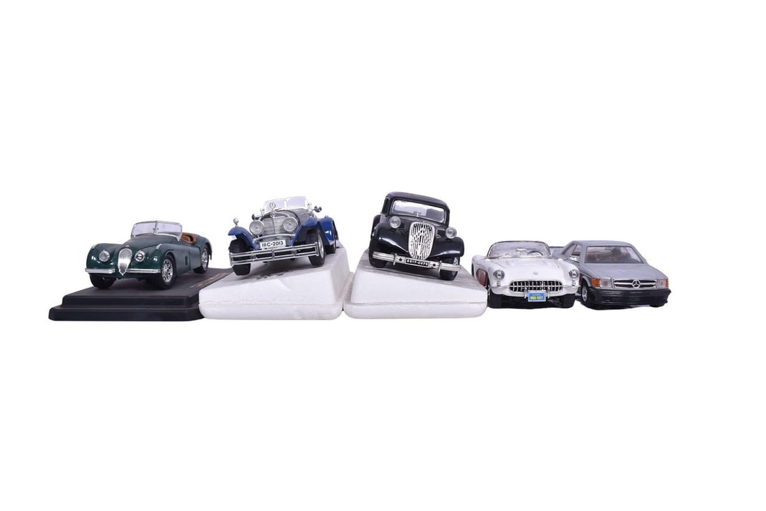 Five Burago car models, including a 1948 Jaguar, 1957 Chevrolet Corvette, Mercedes 500 SEC, Citroen, (1 of 5)