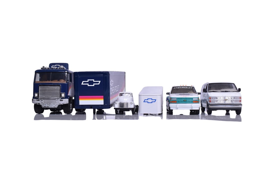 Four larger scale model van, truck and semis. Two by Brookfield Collectors Guild, Dale Earnhardt's: Four larger scale model van, truck and semis. Two by Brookfield Collectors Guild, Dale Earnhardt's crew cab dually and fleet operations van, and two by ERTL, large and small Chevrolet semi trucks. No 