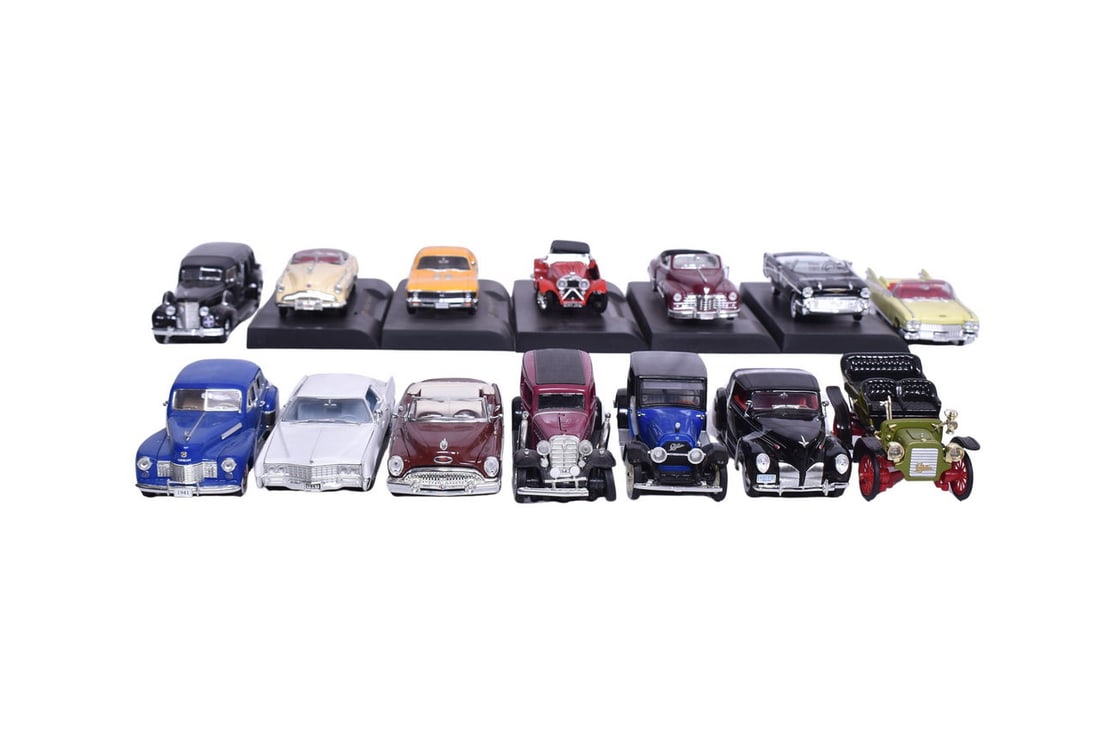 Fourteen of Signature Models' smaller scale model cars. Includes 6 Cadillacs from the 1940s through (1 of 3)