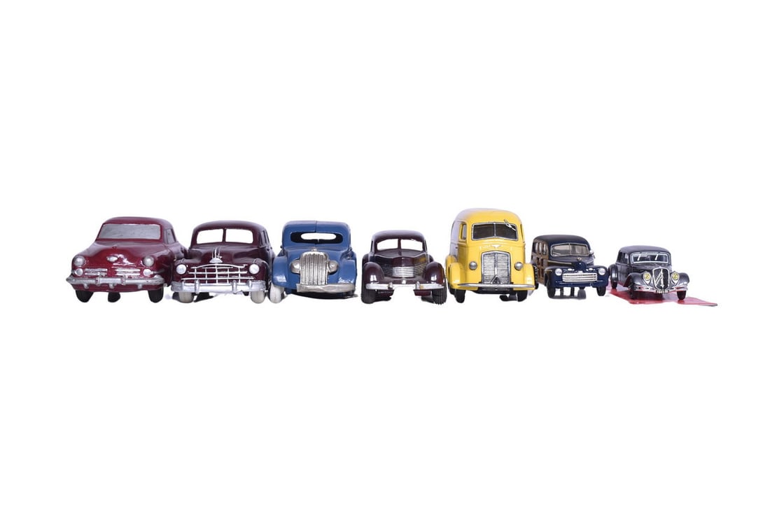 Seven mixed scale model cars. Standouts include Auburn Rubber Corp's rubber model of a Ford front (1 of 7)