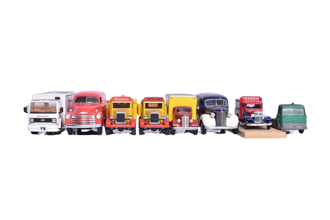 Seven delivery trucks and vans of varying scales. Model makers include Siku, First Gear, Lesney and (1 of 6)