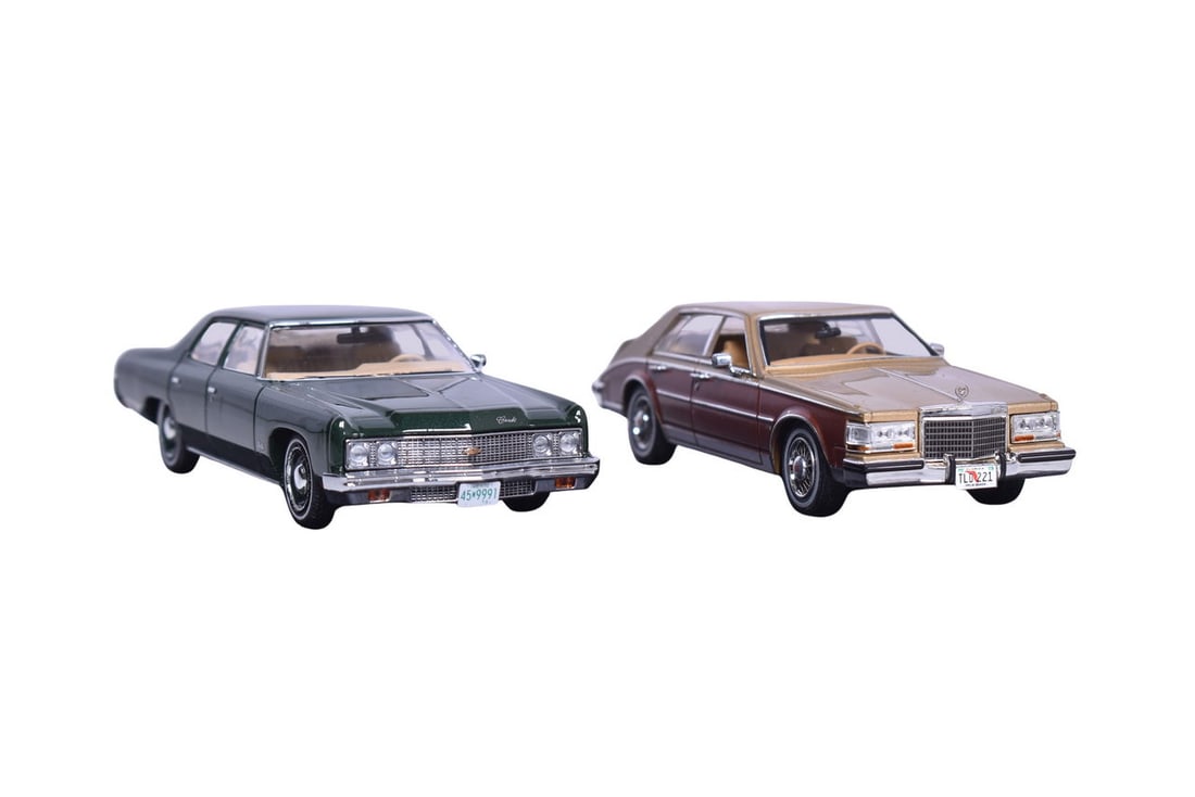 Two Premium X 1:43 scale resin models: a Chevrolet Bel Air and a 1980 Cadillac Seville Elegante.: Two Premium X 1:43 scale resin models: a Chevrolet Bel Air and a 1980 Cadillac Seville Elegante. Both come with original plastic display cases, Bel air is missing its display plaque, cars are in like 