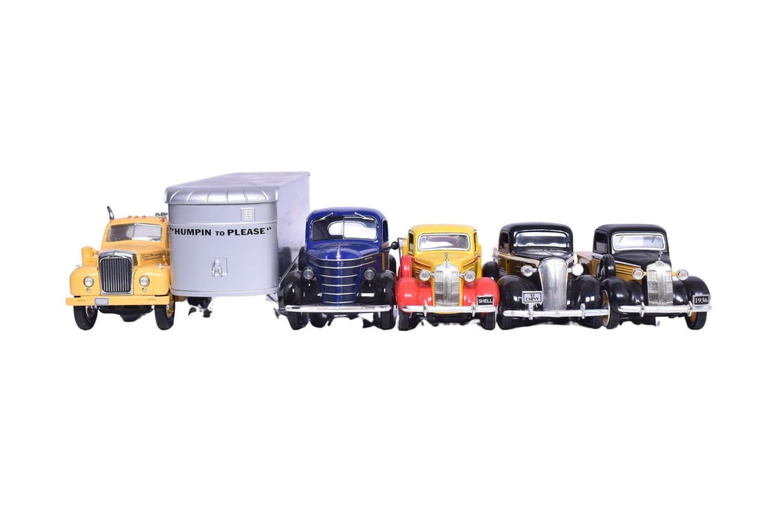 Two First Gear, Inc models and three Liberty Classics model truck coin banks, including a First (1 of 5)