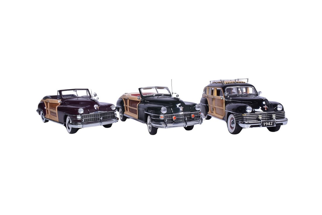 Three 1:24 scale diecast models of 1940s Chrysler Town and Country cars, two by Franklin Mint and: Three 1:24 scale diecast models of 1940s Chrysler Town and Country cars, two by Franklin Mint and one by Danbury Mint. No original packaging, like new condition.