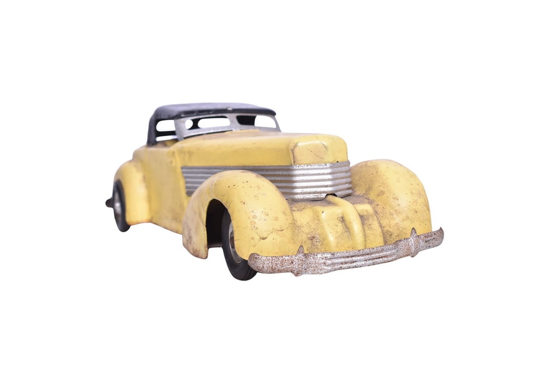 All Metal Products Co. or Wyandotte Toys model of a 1937 Cord. Scale is estimated at 1:10. No (1 of 4)