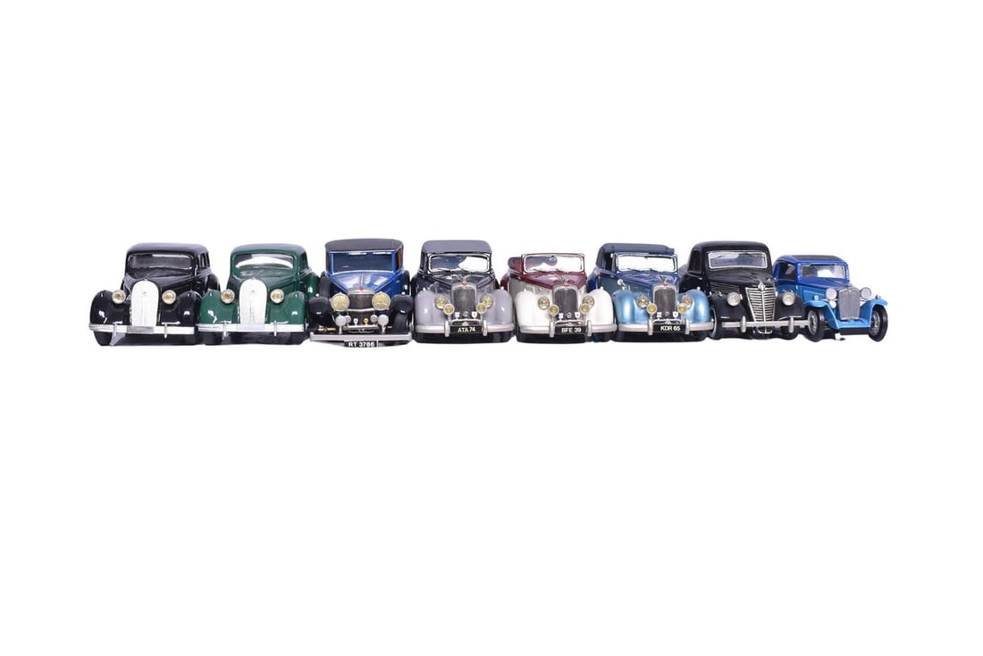 Eight roughly 1:43 scale model cars, four by Top Marque, two Record, a MA collection and an (1 of 7)
