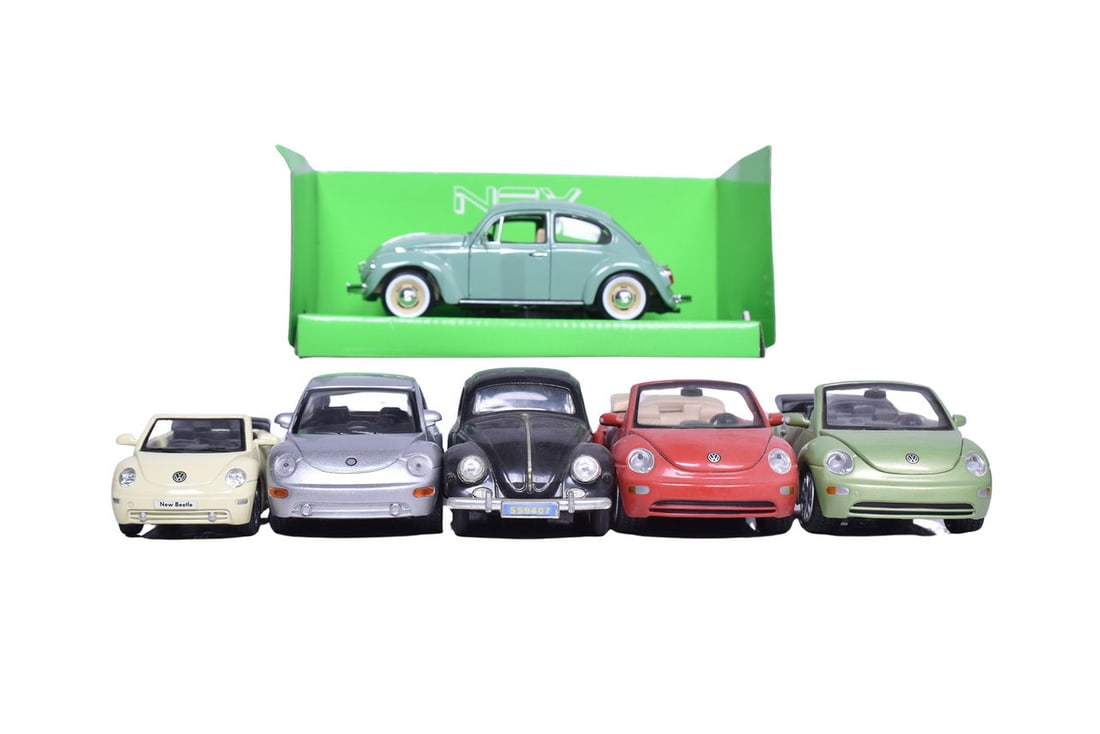 Six Volkswagen models: one Nex, two Maisto 1:25 scale, one Sunnyside, one unmarked, and one: Six Volkswagen models: one Nex, two Maisto 1:25 scale, one Sunnyside, one unmarked, and one Kinsmart. The Nex model is the only one with some of its original packaging, like new condition.