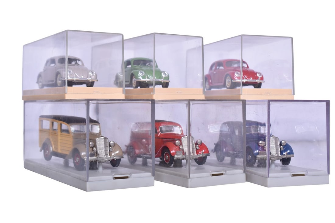 Three each of Rio model Volkswagen Beetles and Rextoys model Ford Station Wagons. All come with (1 of 3)