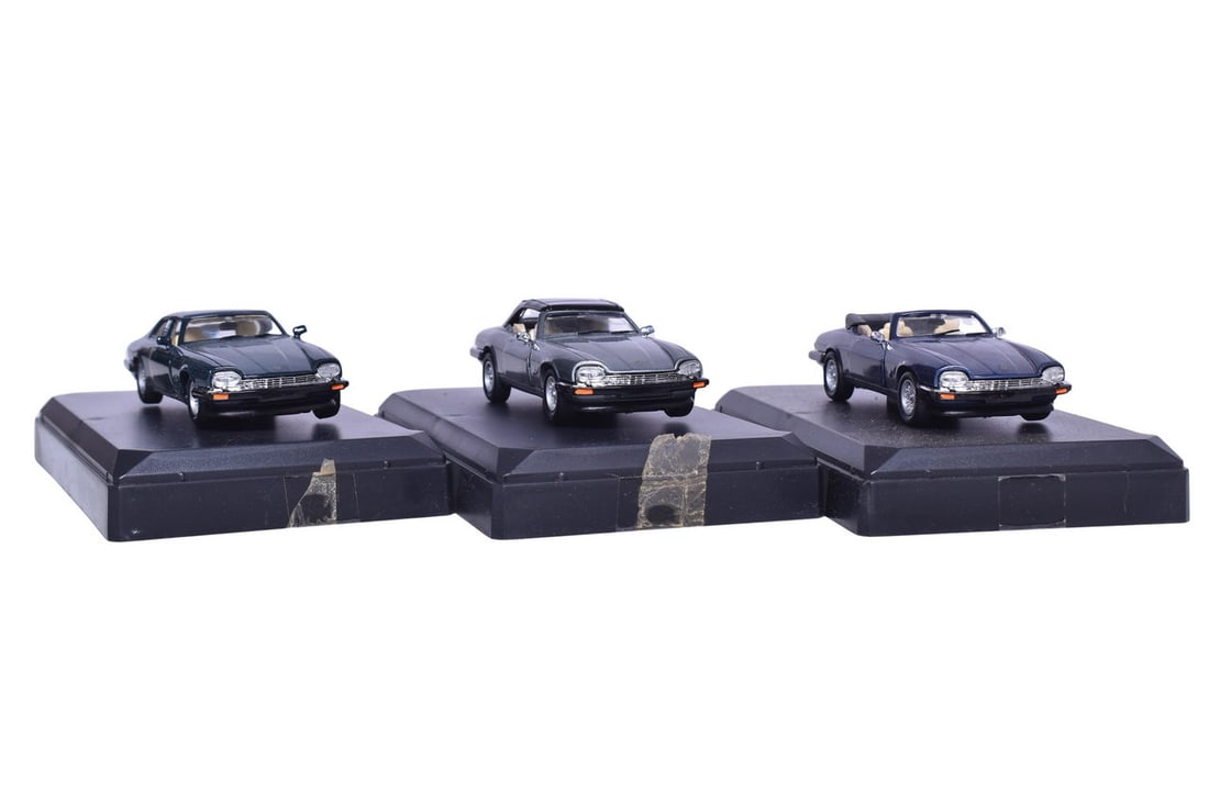 Three Detail Cars Jaguar models, each with their original display stand. Two cars have their full (1 of 3)