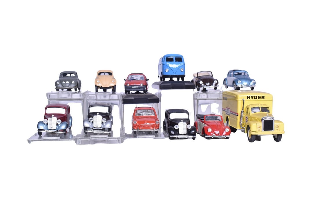 Twelve Vitesse model cars, eleven 1:43 scale, one unknown scale. Make of car included are: Twelve Vitesse model cars, eleven 1:43 scale, one unknown scale. Make of car included are Mercedes-Benz, Volkswagen, and Mack truck. Nine come with original plastic display case, one case is broken.