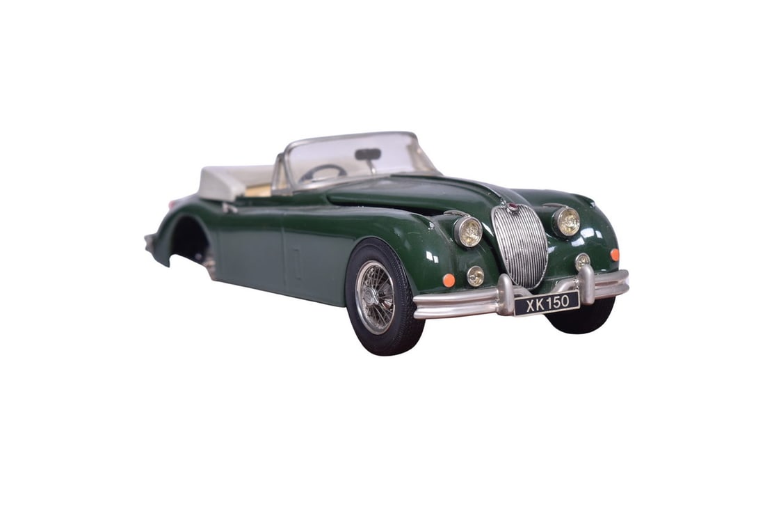 Smalls Wheels 1:24 scale white metal model of a Jaguar XK150 in dark green. No date apparent, but (1 of 3)