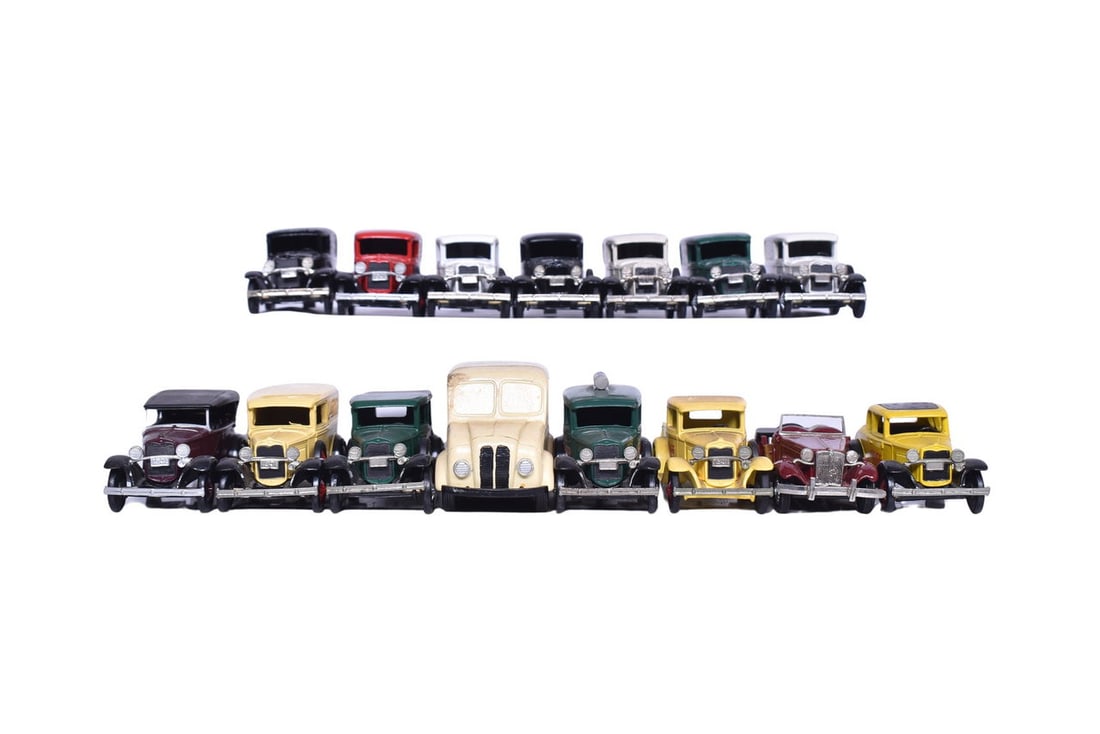 Fifteen Nostalgic Miniatures white metal 1:43 scale model cars. Makes of car included are Divco, (1 of 4)
