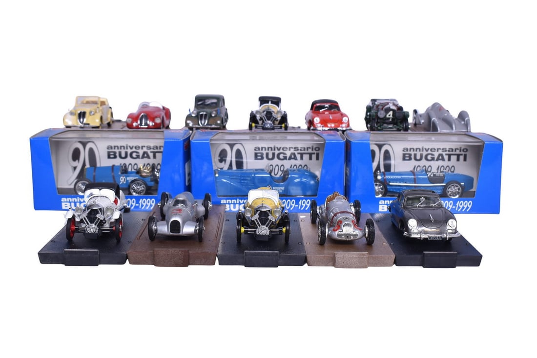 Fifteen 1:43 scale diecast model cars by Brumm. Some of the makes of car included are Auto Union,: Fifteen 1:43 scale diecast model cars by Brumm. Some of the makes of car included are Auto Union, Porsche, Fiat, Bugatti, and Mercedes-Benz. All cars come in their original plastic display cases, thre