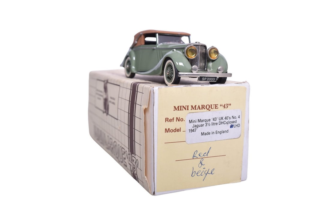 1:43 die cast Mini Marque 43 UK 40's No.4 1947 Jaguar with a semi correct box. (the colors written: 1:43 die cast Mini Marque 43 UK 40's No.4 1947 Jaguar with a semi correct box. (the colors written on the end are incorrect). Hood ornament is missing.