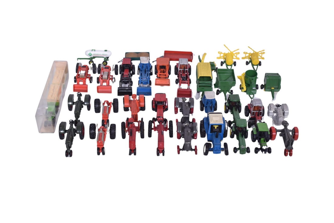 Group of farming toys / tractors including Case, Farmall, John Deere, Challenger, Ford, Massey: Group of farming toys / tractors including Case, Farmall, John Deere, Challenger, Ford, Massey Ferguson, International, and more. Includes models from the 1930's up to the 1980s' All generally in good