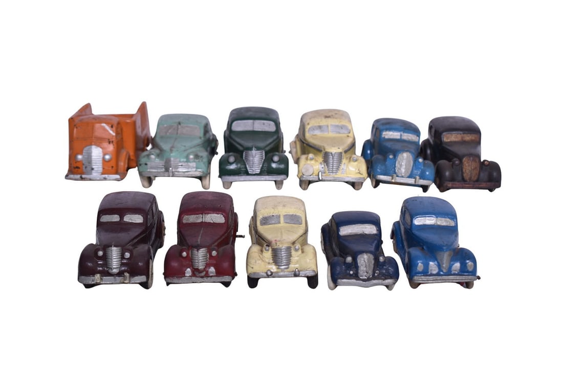 Group of eleven rubber cars and trucks from Auburn Rubber, Rubrtoy, and Arcor. Includes Oldsmobile (1 of 3)