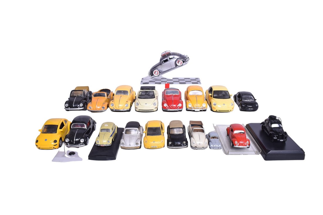 Group of nineteen Volkswagen Beetle models. There are multiple scales, colors, and years from the (1 of 3)