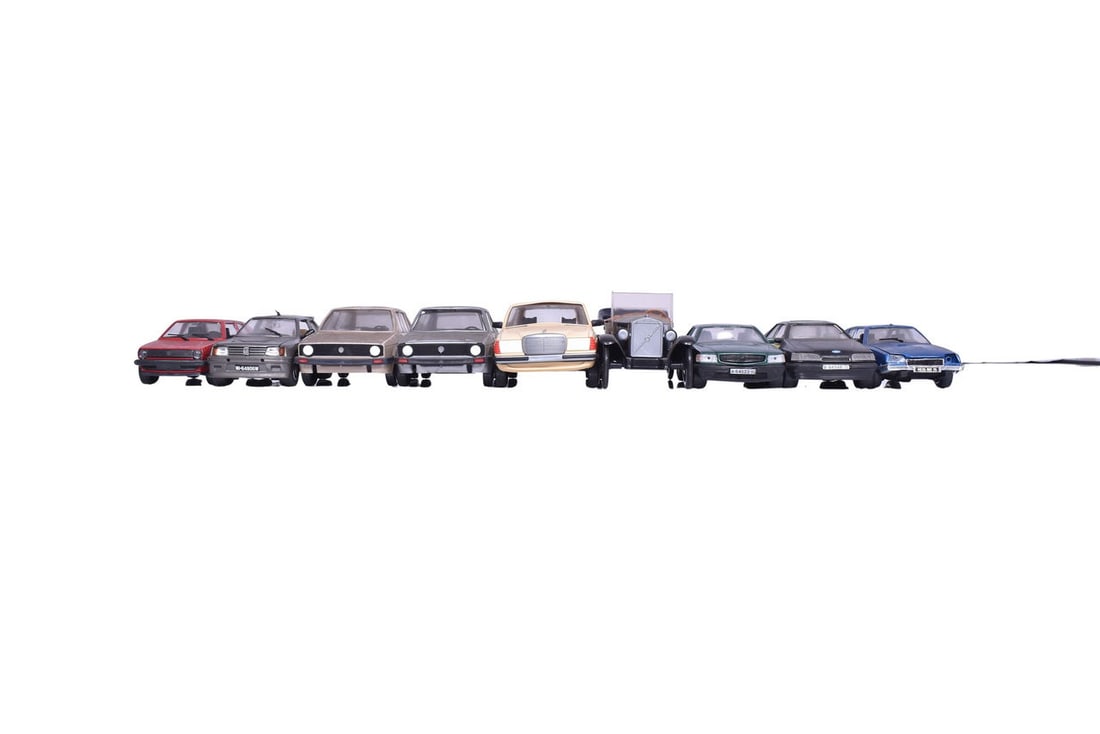 Group of 1:24 models including Guiloy Ford Scorpio Ghia, Mercedes 500 SEC, Polistil Citroen CX 2200,: Group of 1:24 models including Guiloy Ford Scorpio Ghia, Mercedes 500 SEC, Polistil Citroen CX 2200, Volkswagen Golf GL, two 03127 VW Golf, plastic Mercedes wagon, Volvo open roadster, and a CB.Car di