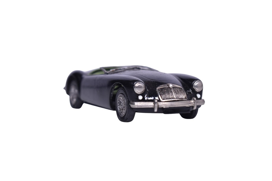 1:43 white metal MG convertible in black. There are no manufacturing marks on the model, but the (1 of 3)