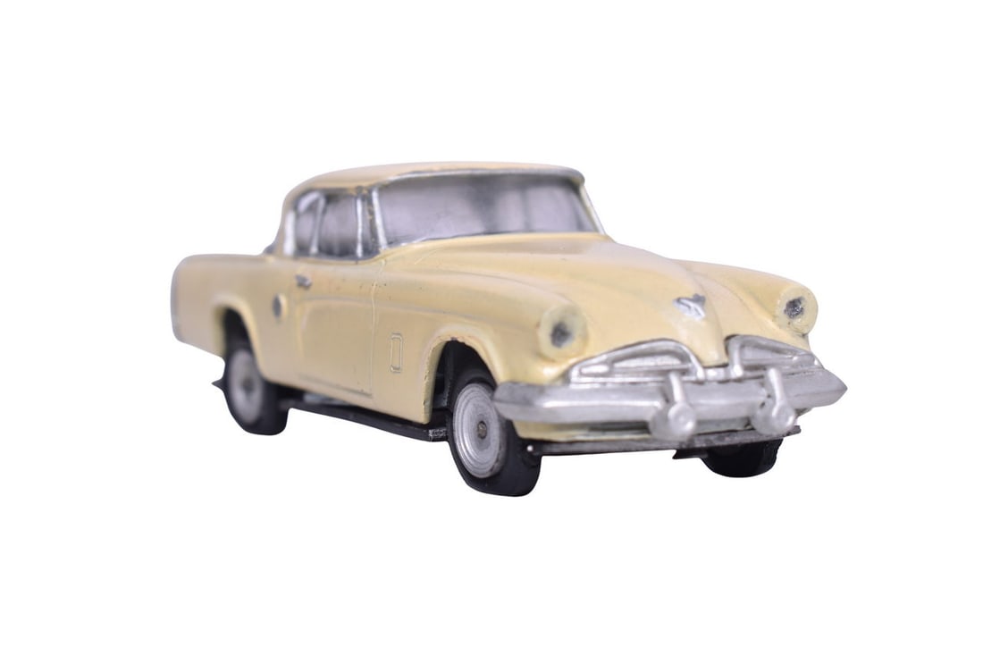 Mikansue 1953 Studebaker Coupe in yellow. Tires have some cracking and flat spotting. Floor has a (1 of 4)