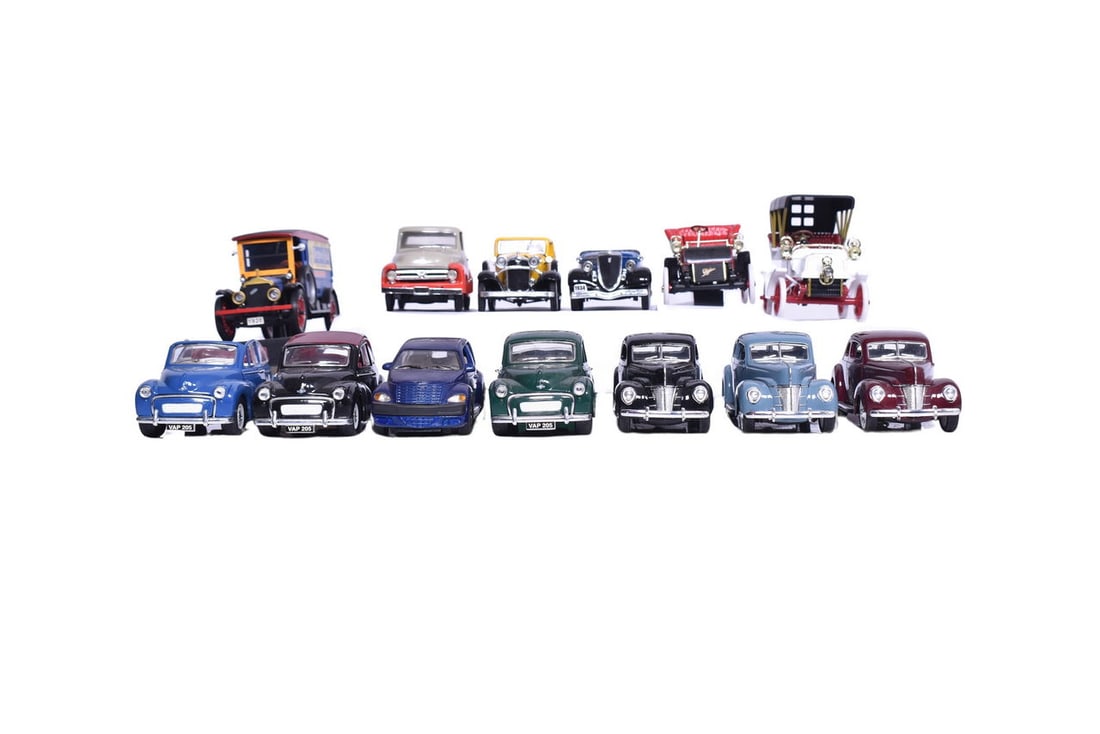 Group of 13 1:34 scale vehicles. Many are die cast but some are plastic. There's a wide variety of: Group of 13 1:34 scale vehicles. Many are die cast but some are plastic. There's a wide variety of makes and modes in this group including Signature, Saico, and more. Car makes include Ford, Chrysler,