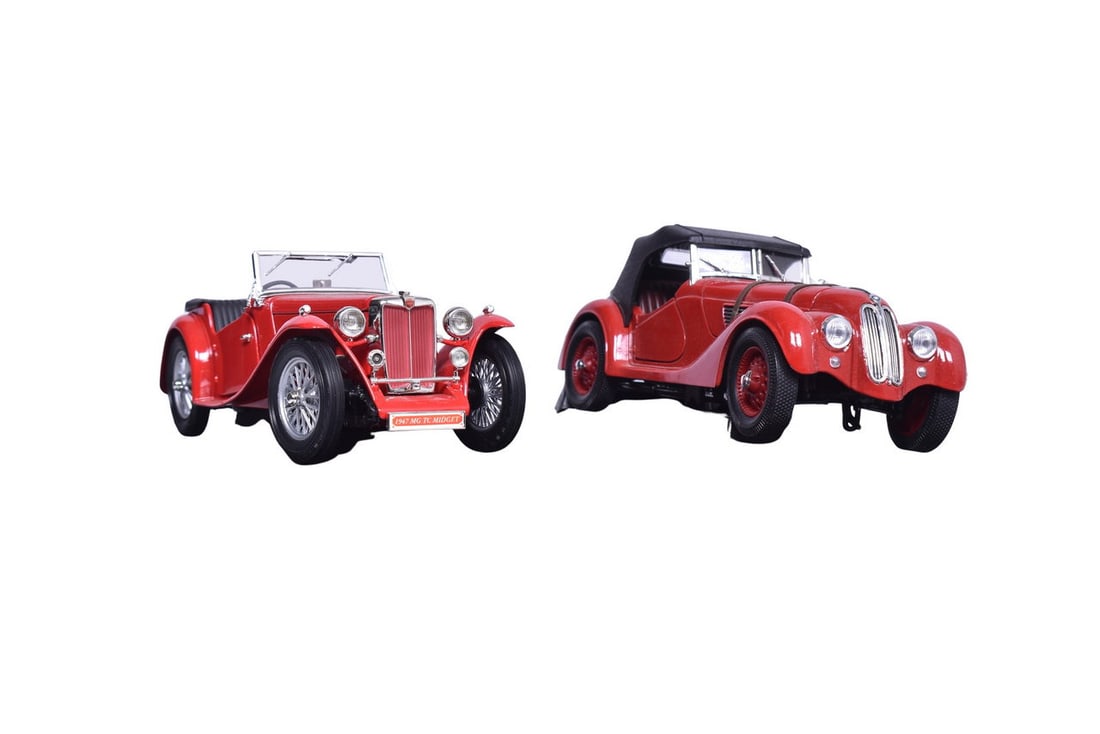 Two 1:18 scale model cars - a 1947 MG TC Midget by Road Signature, and a 1940 BMW 328 by Road: Two 1:18 scale model cars - a 1947 MG TC Midget by Road Signature, and a 1940 BMW 328 by Road Legends. Both come with original plastic display platforms, good condition with no missing parts or damage