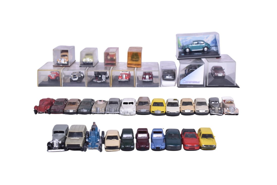 Thirty-seven model cars, all suspected to be around 1:87 scale or similar. Model makers spotted (1 of 3)