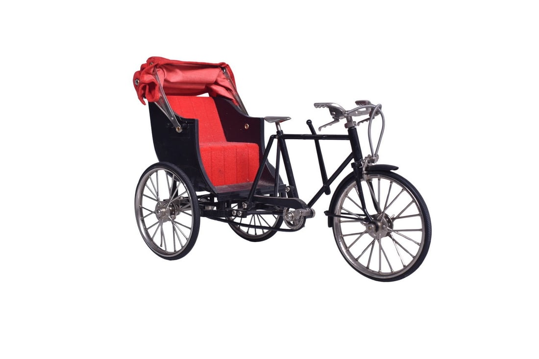 Roughly 11" by 4 1/2" by 7" model of a tricycle carriage, complete with folding velvet cover. (1 of 3)