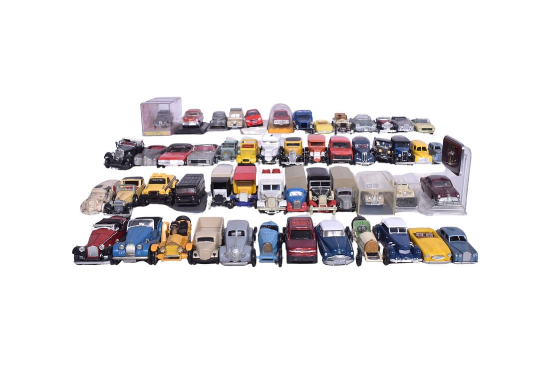 Roughly 50 model cars that are 1:43 scale or similar. Model makers spotted include Buby's Classics, (1 of 4)