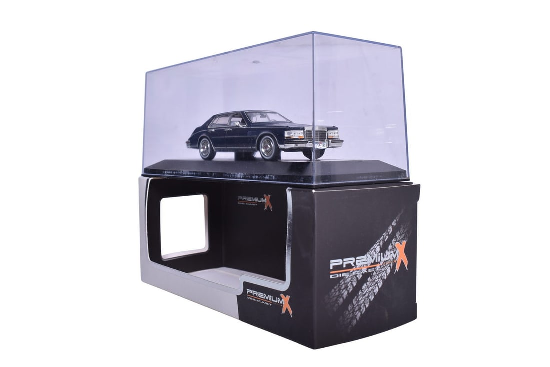 Premium X die cast 1:43 scale PRD110 Cadillac Seville "Elegante" in black. Original box and plastic: Premium X die cast 1:43 scale PRD110 Cadillac Seville "Elegante" in black. Original box and plastic display case, like new condition. Box size 8" x 8" x 4"