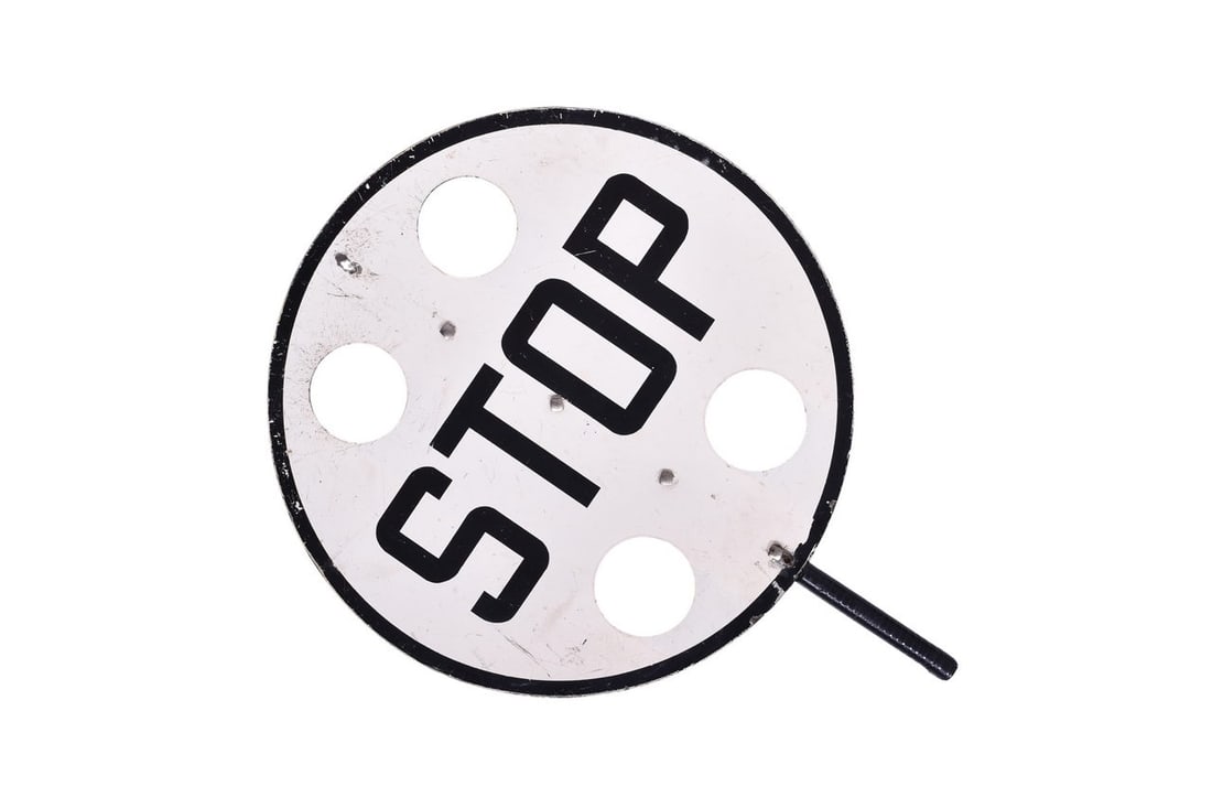 18" diameter porcelain STOP sign with a short 5 1/2" handle. Sign has mild porcelain chipping (1 of 2)