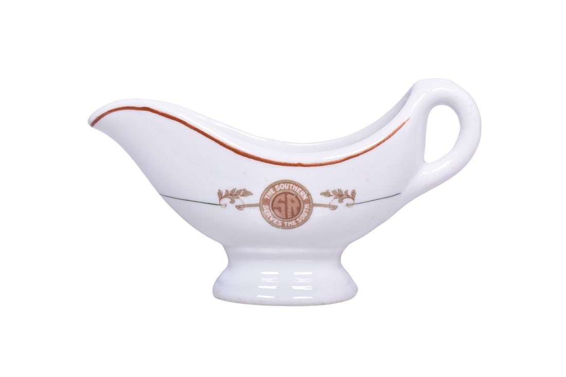 A 7" long gravy boat for the Southern Railway in the Peach Blossom pattern side marked with the (1 of 4)