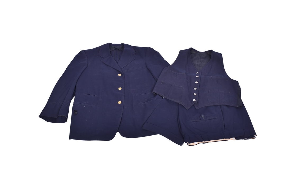 Jacket made by Becker Uniforms decorated with three large brass L&N buttons and four smaller: Jacket made by Becker Uniforms decorated with three large brass L&N buttons and four smaller L&N buttons at the sleeves. Jacket measures 18 1/4" at the shoulder, 20 3/4" under the arms and 19 
