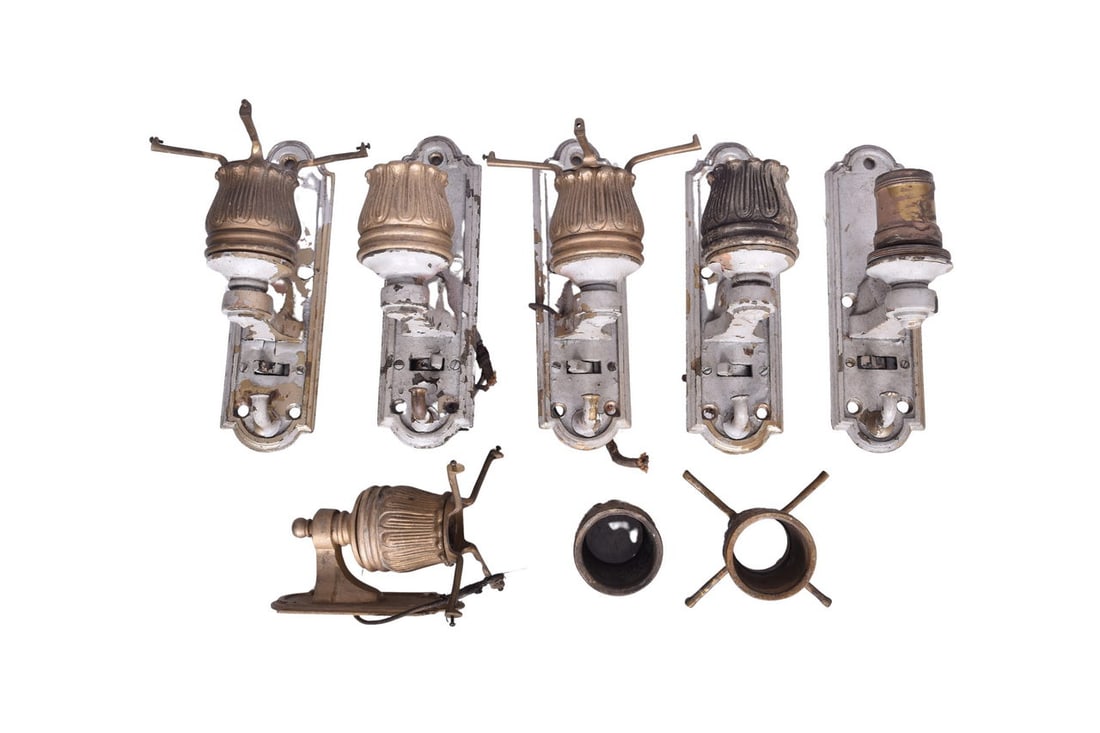 A set of five and one brass wall sconces. The set of five each measure about 7 1/2" long and each (1 of 4)